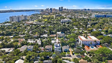 A vision of modern Palm Beach luxury, this brand-new 2025