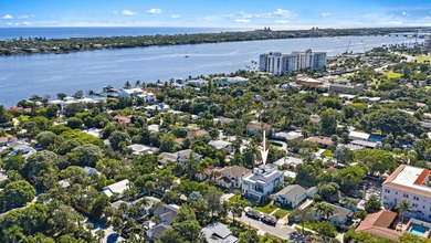 A vision of modern Palm Beach luxury, this brand-new 2025