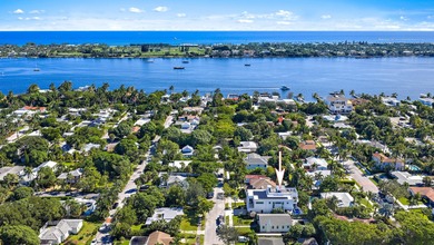 A vision of modern Palm Beach luxury, this brand-new 2025