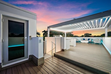 A vision of modern Palm Beach luxury, this brand-new 2025