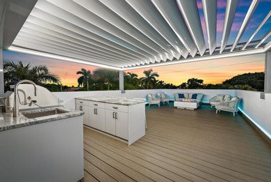 A vision of modern Palm Beach luxury, this brand-new 2025