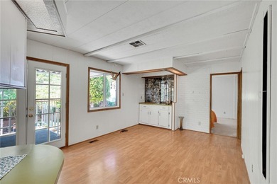 This is a Lovely Home that cuddles the Top of the Hill on the