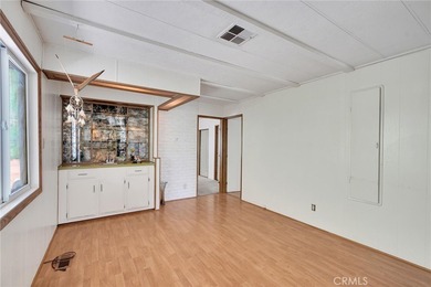 This is a Lovely Home that cuddles the Top of the Hill on the