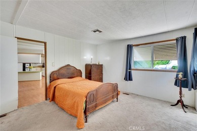 This is a Lovely Home that cuddles the Top of the Hill on the