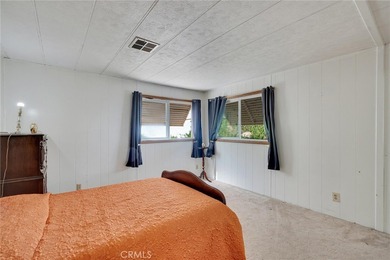 This is a Lovely Home that cuddles the Top of the Hill on the