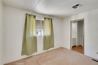 This is a Lovely Home that cuddles the Top of the Hill on the