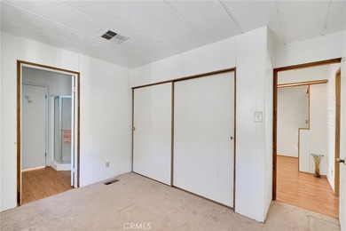 This is a Lovely Home that cuddles the Top of the Hill on the