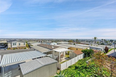 This is a Lovely Home that cuddles the Top of the Hill on the