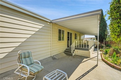 This is a Lovely Home that cuddles the Top of the Hill on the