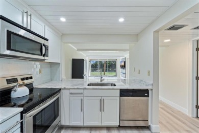 WOW! Fabulously updated 2nd floor unit with a perfect North