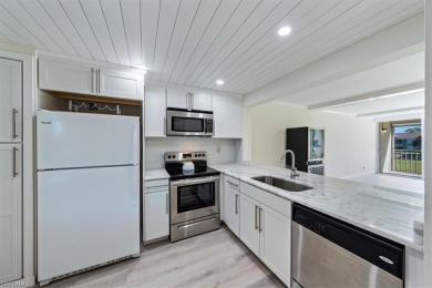 WOW! Fabulously updated 2nd floor unit with a perfect North