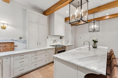 Welcome to 4 Trapman Street -- a beautifully designed townhome