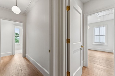 Welcome to 4 Trapman Street -- a beautifully designed townhome