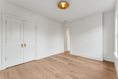 Welcome to 4 Trapman Street -- a beautifully designed townhome