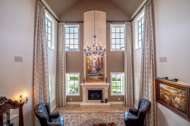 A stunning French-style home situated along a dramatic coastal