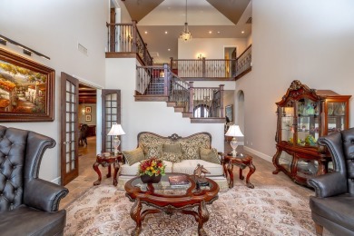 A stunning French-style home situated along a dramatic coastal