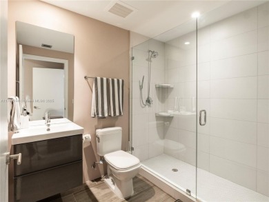 Experience luxury living in this beautifully designed 2-bed, 2