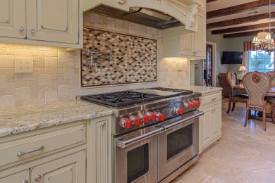 A stunning French-style home situated along a dramatic coastal