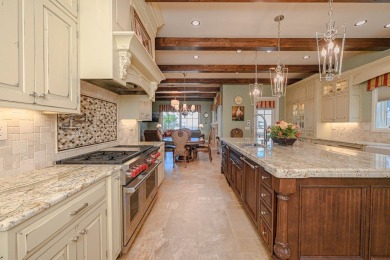 A stunning French-style home situated along a dramatic coastal