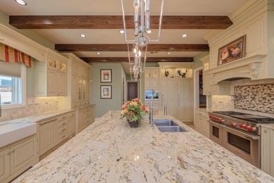 A stunning French-style home situated along a dramatic coastal