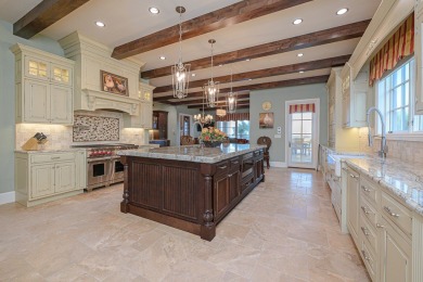 A stunning French-style home situated along a dramatic coastal