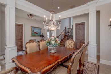 A stunning French-style home situated along a dramatic coastal