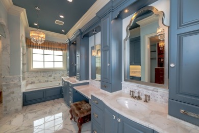 A stunning French-style home situated along a dramatic coastal