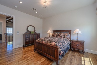 A stunning French-style home situated along a dramatic coastal