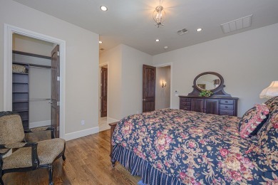 A stunning French-style home situated along a dramatic coastal