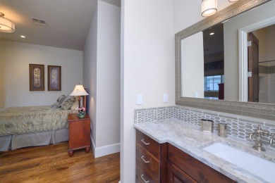 A stunning French-style home situated along a dramatic coastal