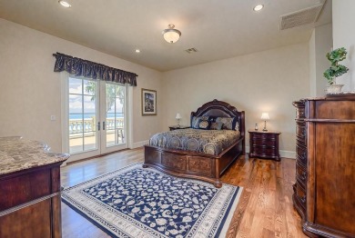 A stunning French-style home situated along a dramatic coastal