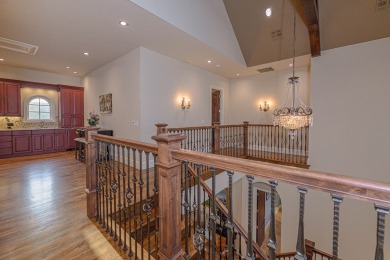 A stunning French-style home situated along a dramatic coastal