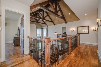 A stunning French-style home situated along a dramatic coastal