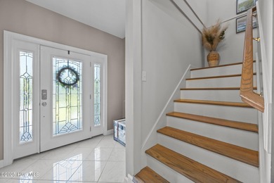 Welcome to this stunning 4-bedroom, 3.5-bath reverse floorplan