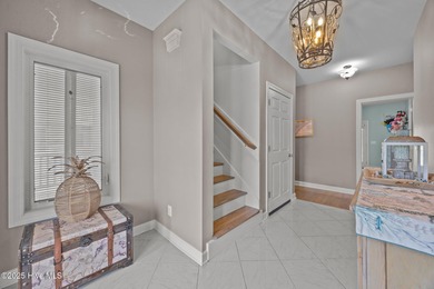 Welcome to this stunning 4-bedroom, 3.5-bath reverse floorplan