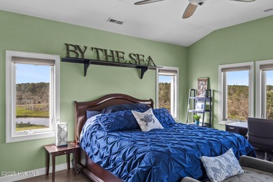 Welcome to this stunning 4-bedroom, 3.5-bath reverse floorplan