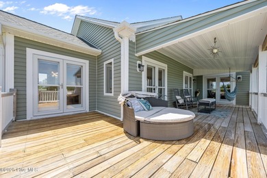 Welcome to this stunning 4-bedroom, 3.5-bath reverse floorplan