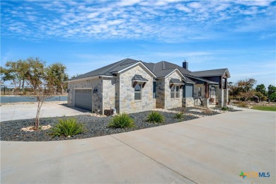 Nestled on a sprawling 1.6-acre lot, this stunning custom home