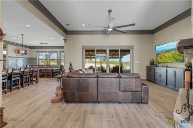 Nestled on a sprawling 1.6-acre lot, this stunning custom home