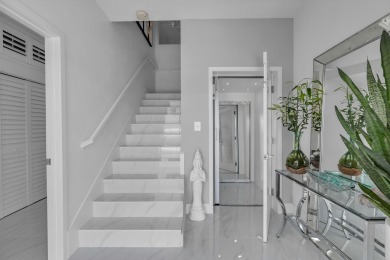 Discover this impeccable modern concrete home, perfectly