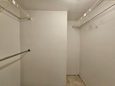 Beautiful 1BR/1.5BA condo with ceramic tile flooring in gated