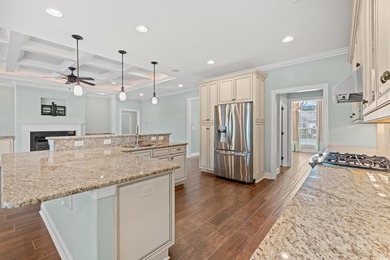 Come see this stunning custom built all brick home located in