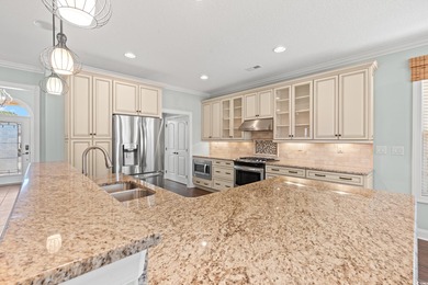 Come see this stunning custom built all brick home located in