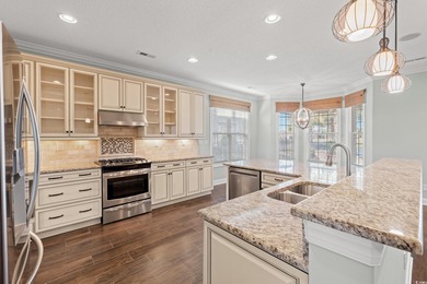 Come see this stunning custom built all brick home located in