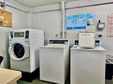 Beautiful 1BR/1.5BA condo with ceramic tile flooring in gated