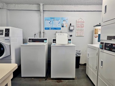 Beautiful 1BR/1.5BA condo with ceramic tile flooring in gated