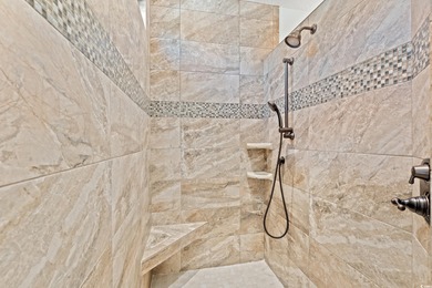 Come see this stunning custom built all brick home located in