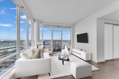 Experience elevated living in this rare 2 Bd/2 Ba & Den & Flex