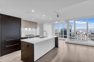 Experience elevated living in this rare 2 Bd/2 Ba & Den & Flex