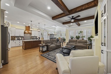 Experience the ease of single-level living in one of the rare